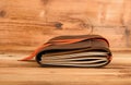 Notebook in leather cover on wooden table Royalty Free Stock Photo