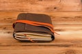 Notebook in leather cover on wooden table Royalty Free Stock Photo