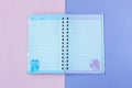 Notebook with lines. School stationery on a pink and purple duotone background Royalty Free Stock Photo