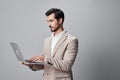 man internet copyspace computer working smiling laptop business freelancer job suit