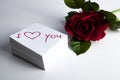 Notebook with marker inscription I love you and rose