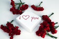 Notebook with marker inscription I love you and roses