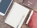 Notebook, mobile phone, purse and passport Royalty Free Stock Photo