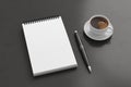 Notebook mockup. Blank workplace notebook. Spiral notepad on dark wooden desk Royalty Free Stock Photo