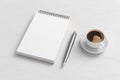 Notebook mockup. Blank workplace notebook. Spiral notepad on white wooden desk Royalty Free Stock Photo