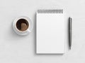 Notebook mockup. Blank workplace notebook. Spiral notepad on white wooden desk Royalty Free Stock Photo