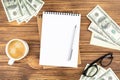 notebook with money cash dollars Royalty Free Stock Photo