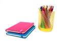 Notebook and multicolored markers on a white background Royalty Free Stock Photo