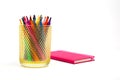 Notebook and multicolored markers on a white background Royalty Free Stock Photo