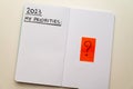 Notebook page, with text ` 2023 priorities`. Royalty Free Stock Photo