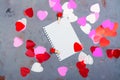 Notebook paper sheet and decorative hearts on Valentines day background Royalty Free Stock Photo