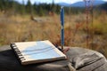 notebook and pen for documenting the hiking journey