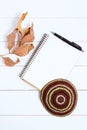 Notebook, pen and kipa on a white wooden background, top view. Jewish New Year, Rosh Hashanah