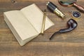 Notebook, Pen, Magnifier, Cpmpass, Pipe, Spyglass On Wood Background Royalty Free Stock Photo