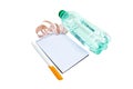 Notebook, pen, measuring tape, water bottle, on a white background Royalty Free Stock Photo