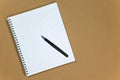 Notebook and pen on paper background Royalty Free Stock Photo