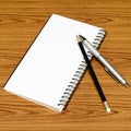 Notebook pen and pencil Royalty Free Stock Photo