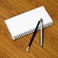 Notebook pen and pencil Royalty Free Stock Photo