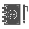 Notebook and pen solid icon. Notepad with smiley vector illustration isolated on white. Study glyph style design