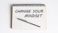 Notebook with pen , text Change Your Mindset ,concept Royalty Free Stock Photo