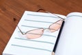 Notebook, pencil, glasses Royalty Free Stock Photo