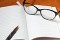 notebook, pencil and glasses Royalty Free Stock Photo