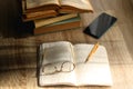 Notebook, Pencil, Glasses, Phone and Books