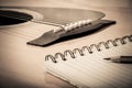 Notebook and pencil on guitar background Royalty Free Stock Photo
