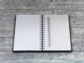 Notebook and pencil on wooden background Royalty Free Stock Photo