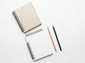 Notebook and pencils isolated on white background Royalty Free Stock Photo