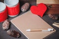 Notebook with red heart-shaped paper Royalty Free Stock Photo