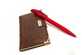 Notebook and red pen Royalty Free Stock Photo
