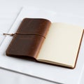 The notebook is resting on a larger white object possibly a book Royalty Free Stock Photo