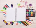 Notebook and school supplies on desk Royalty Free Stock Photo