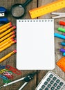 Notebook and school tools around. Royalty Free Stock Photo