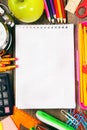 Notebook and school tools around. Royalty Free Stock Photo