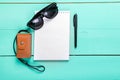 Notebook, shoes, camera Royalty Free Stock Photo