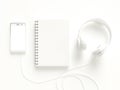 Notebook with smartphone and headphones white color