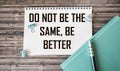Notebook with text Don`t be the same, be better in conceptual image Royalty Free Stock Photo
