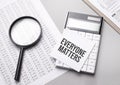 Notebook with text Everyone Matters sheet of white paper for notes, calculator, magnifying glass. Business concept Royalty Free Stock Photo