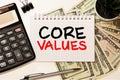 Notebook with text inside Core Values on table Royalty Free Stock Photo