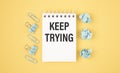 Notebook with text Keep Trying wishlist Royalty Free Stock Photo