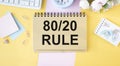 A notebook with the text of the 80-20 rule lies