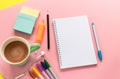 Notebook with to-do-list mockup, coffee mug, pens and sticky notes on pink background