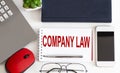 Notebook with Toolls and Notes about COMPANY LAW, business Royalty Free Stock Photo