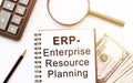 Notebook with Toolls and Notes about ERP Enterprise Resourse Planning,concept Royalty Free Stock Photo