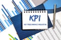 Notebook with Toolls and Notes about KPI with charts,concept Royalty Free Stock Photo