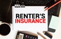 Notebook with Tools and Notes about RENTER INSURANCE Royalty Free Stock Photo