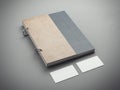 Notebook with two business cards. 3d rendering
