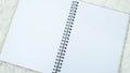 Notebook on white wool top Royalty Free Stock Photo